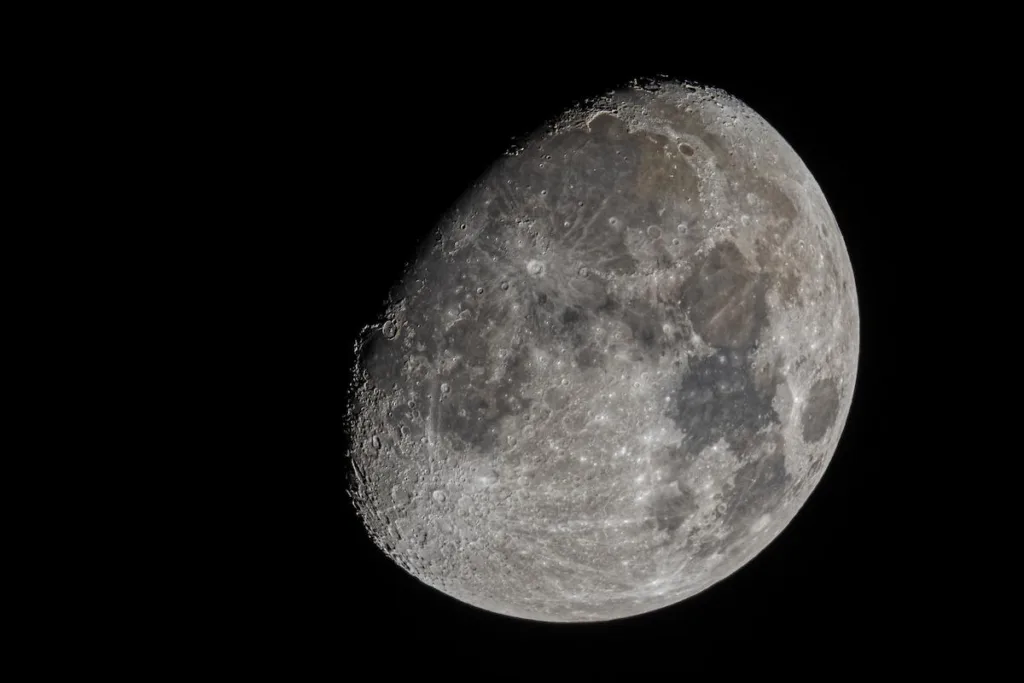 Beautifull moon in 3/4 exposiotion on the black sky